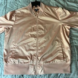 City streets pink bomber jacket